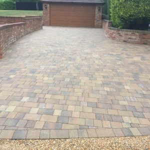 light driveway leading to garage